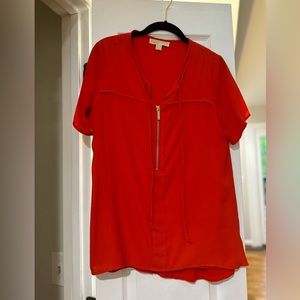 Michael Kors, burnt orange, short sleeve blouse. Size 4.